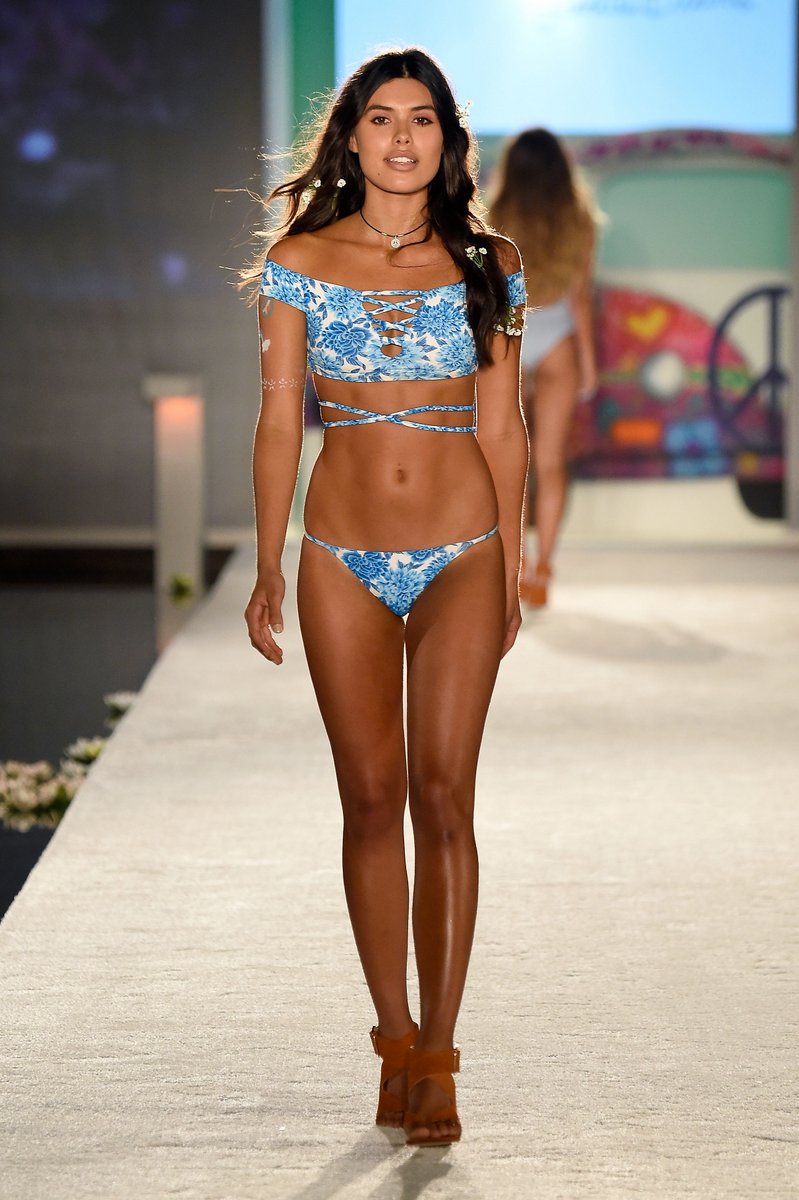 MIAMI BEACH, FL - JULY 15:  A model walks the runway ath the Frankie's Bikinis 2017 Collection at SwimMiami - Runway at W South Beach on July 15, 2016 in Miami Beach, Florida.  (Photo by Frazer Harrison/Getty Images for Frankie's Bikinis)