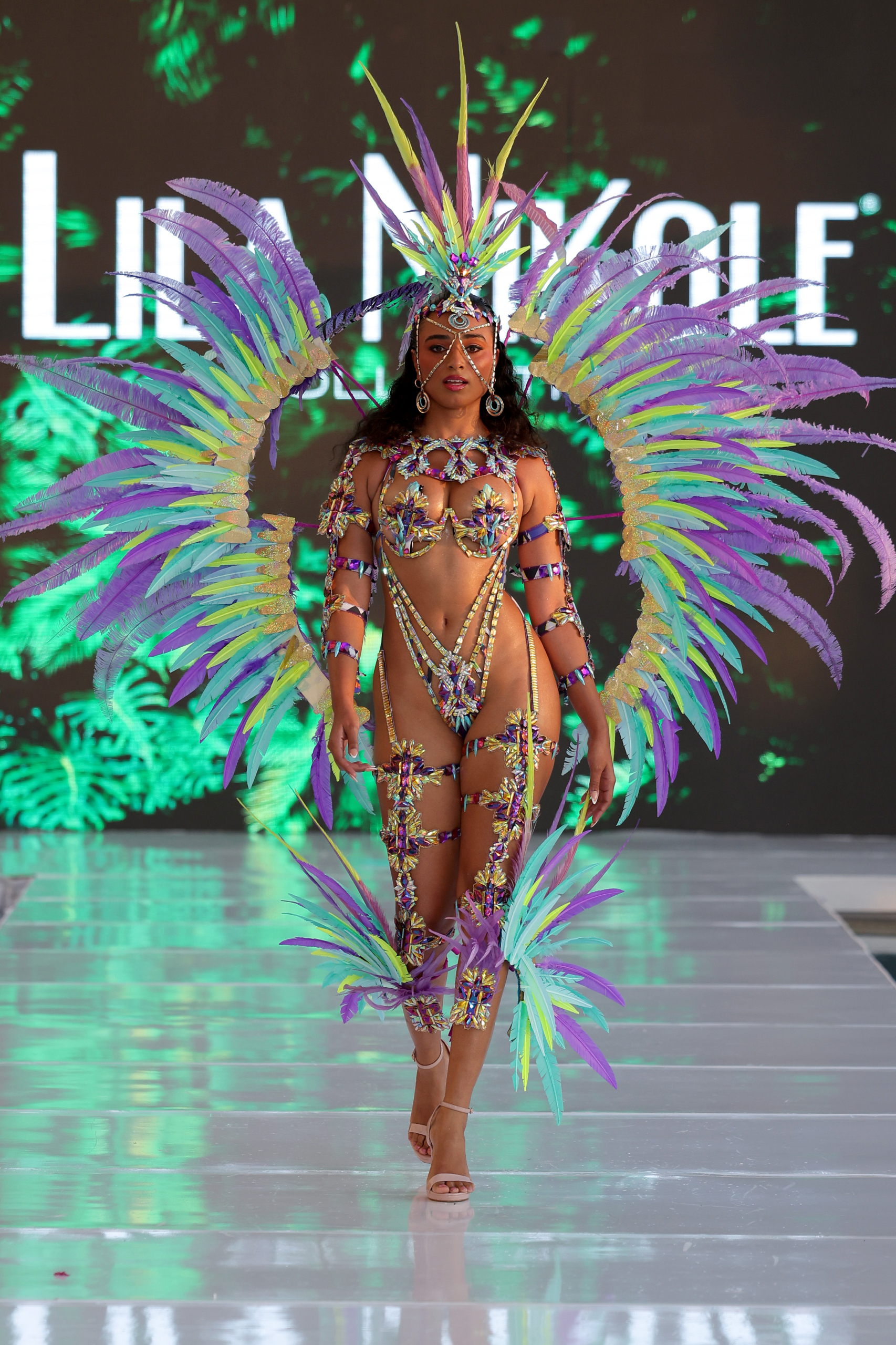 MIAMI BEACH, FLORIDA - JUNE 01: A model walks the runway wearing Lila Nikole during Miami Swim Week: The Shows on June 01, 2025 in Miami Beach, Florida. (Photo by Thomas Concordia/Getty Images for Miami Swim Week: The Shows)
