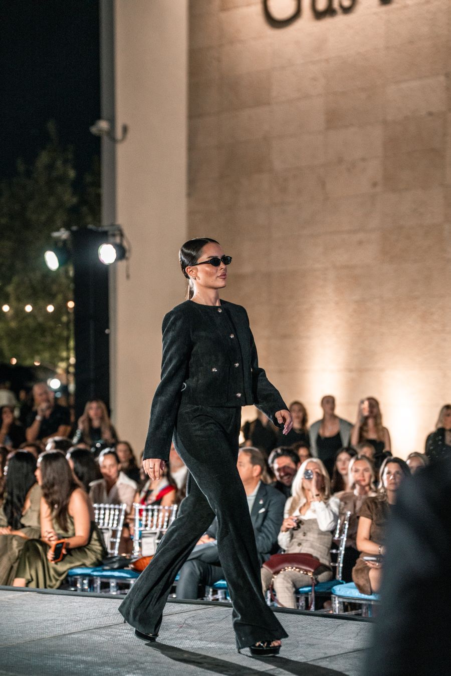 Models wearing Elie Tahari couture at Miami fashion event.