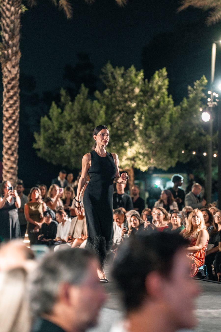 Models wearing Elie Tahari couture at Miami fashion event.