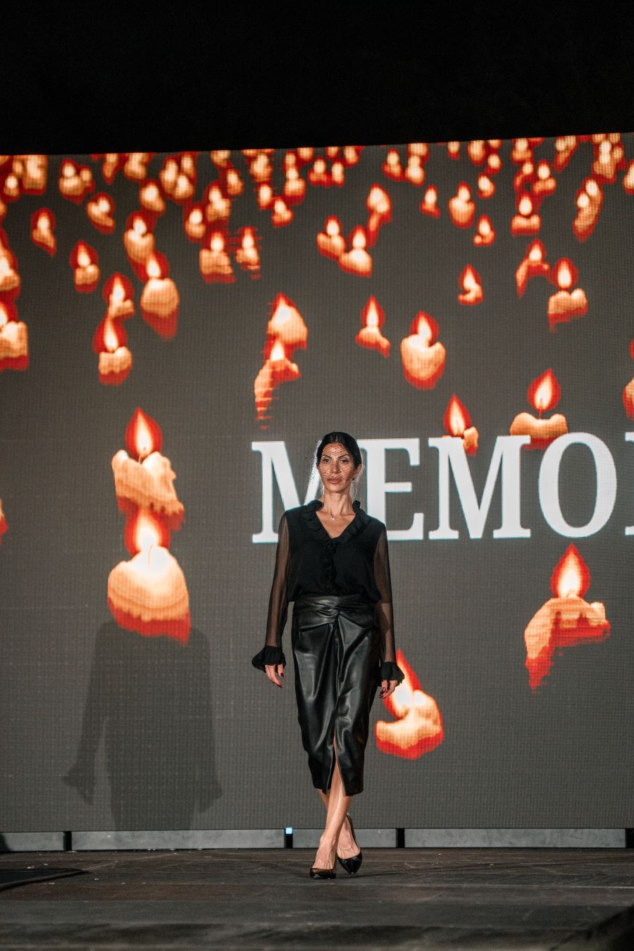 Models wearing Elie Tahari couture at Miami fashion event.