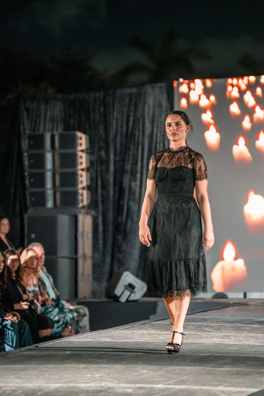 Models wearing Elie Tahari couture at Miami fashion event.