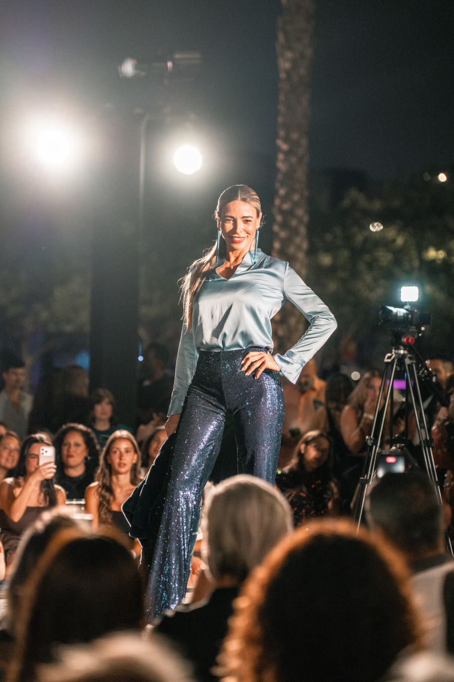 Models wearing Elie Tahari couture at Miami fashion event.