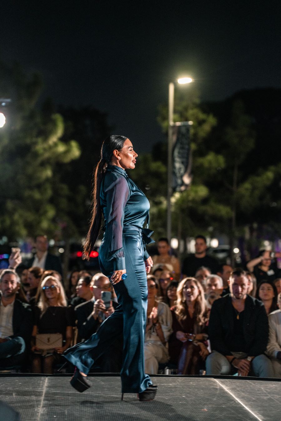 Models wearing Elie Tahari couture at Miami fashion event.