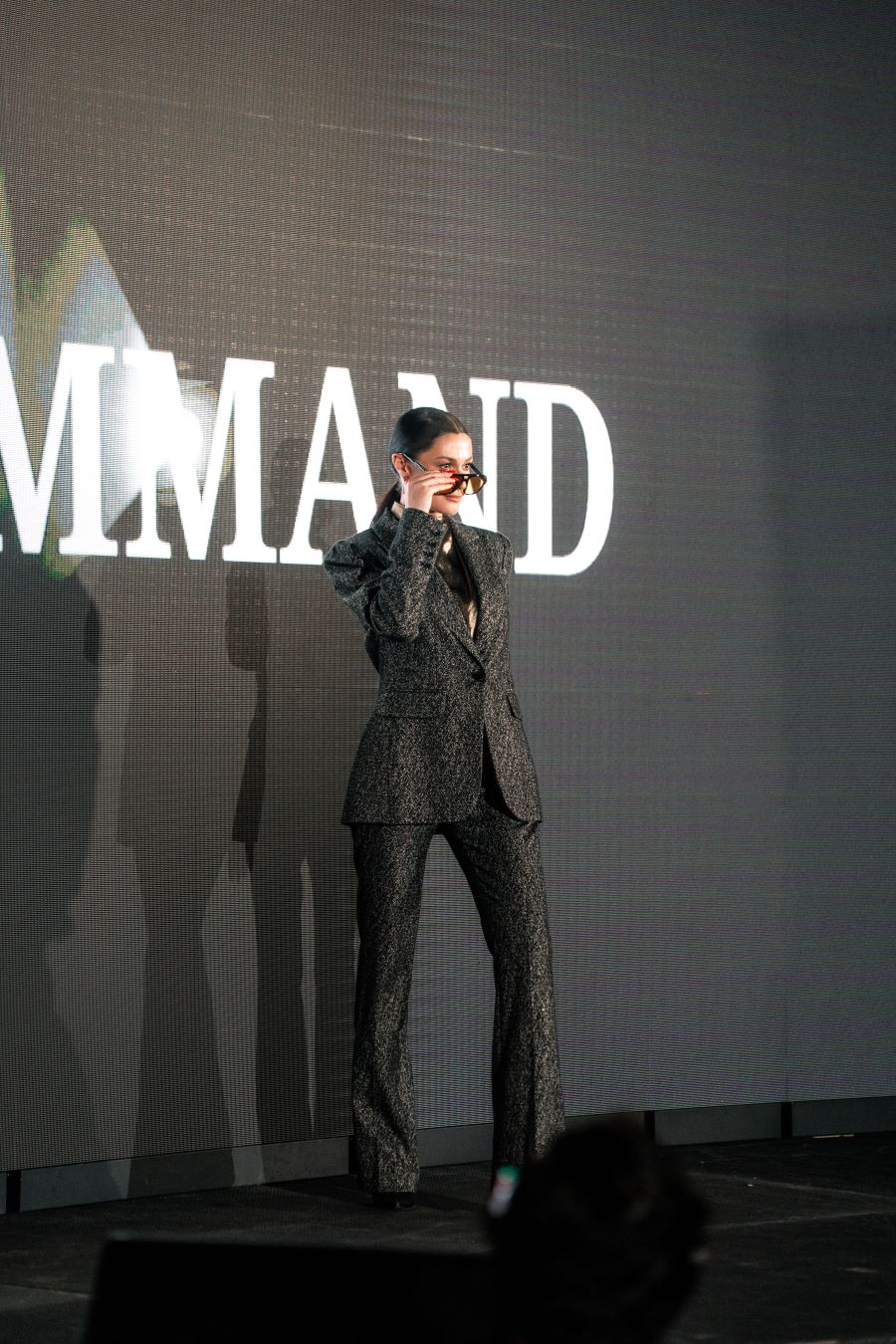 Models wearing Elie Tahari couture at Miami fashion event.