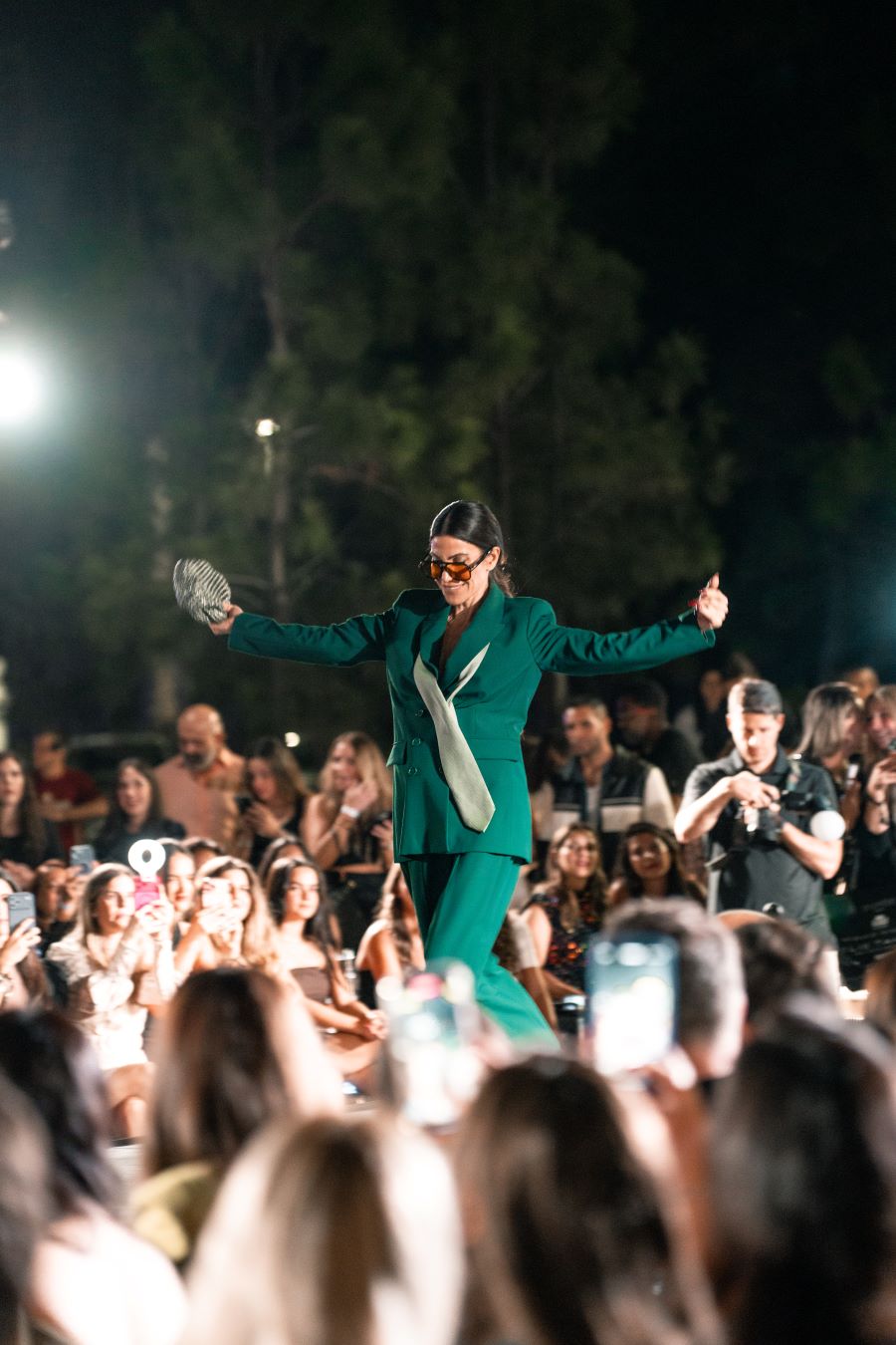 Models wearing Elie Tahari couture at Miami fashion event.