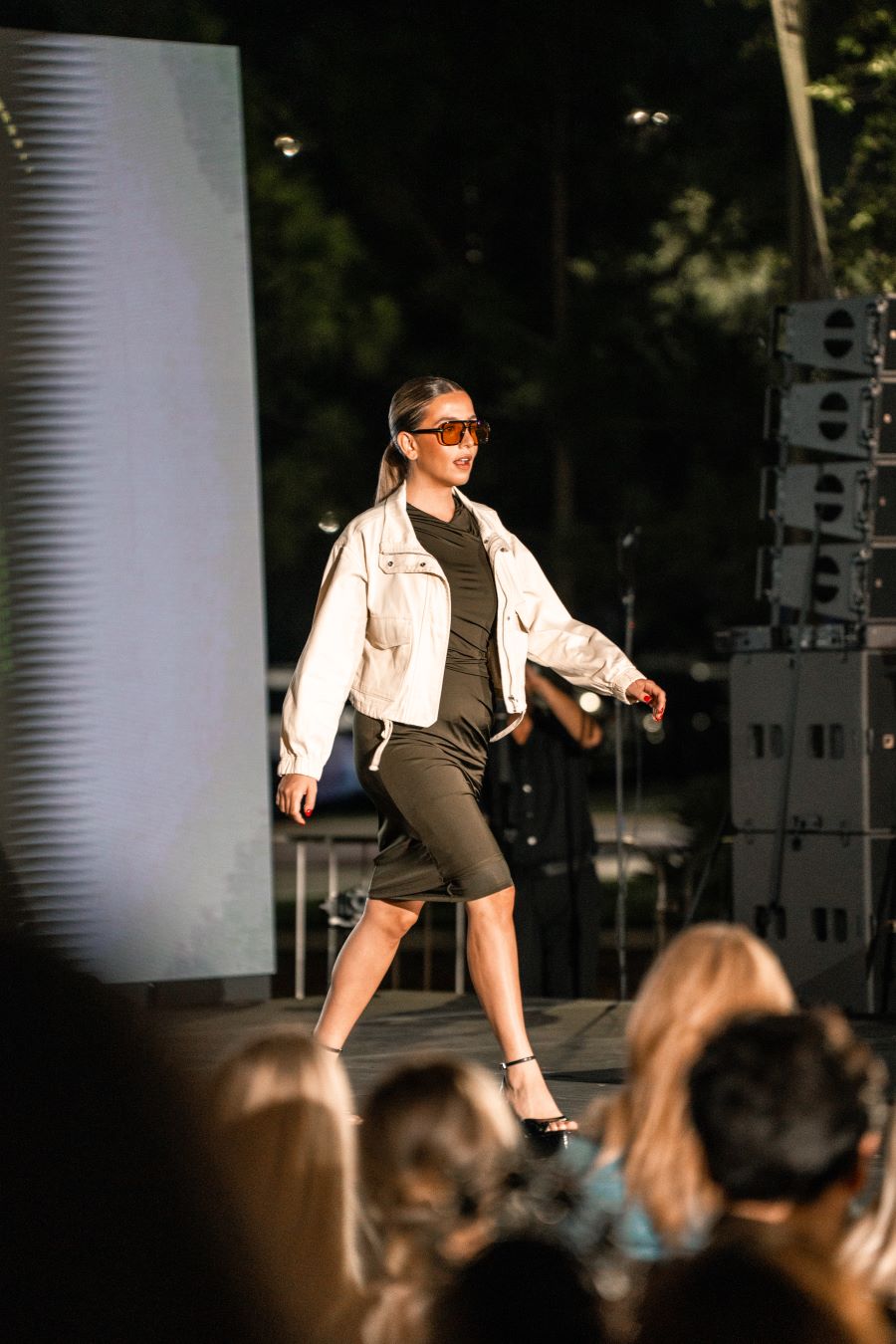 Models wearing Elie Tahari couture at Miami fashion event.