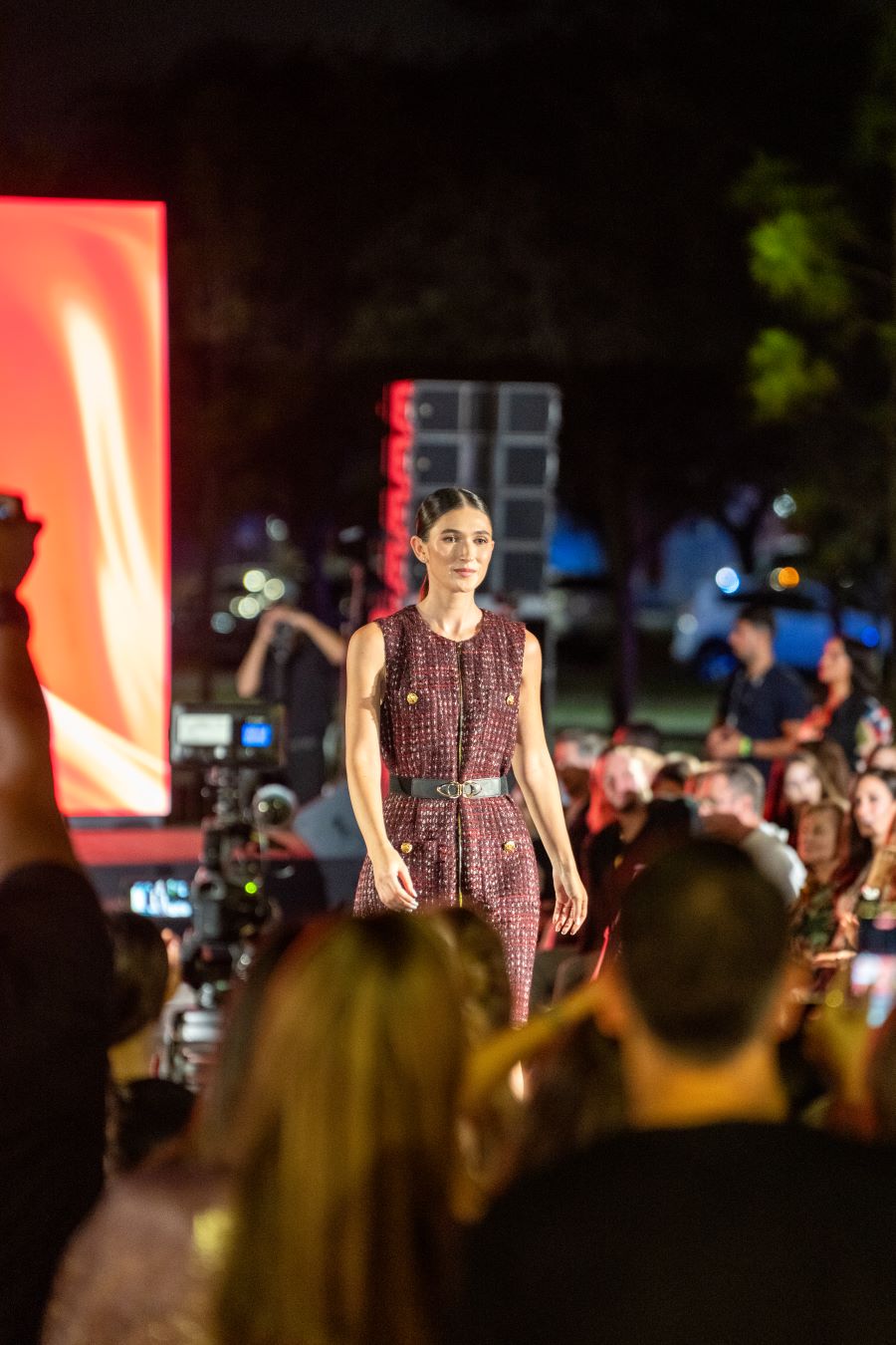 Models wearing Elie Tahari couture at Miami fashion event.